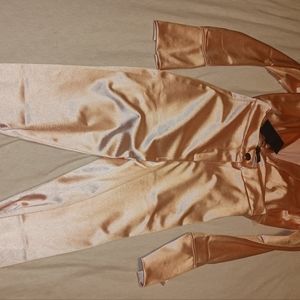 Woman's light pink pantsuit size small.